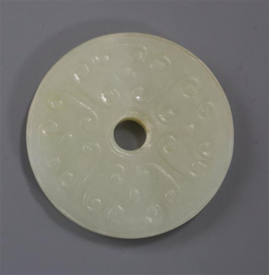 A pale celadon jade bi disc